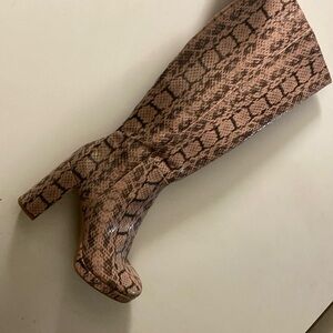 Over the knee snake print boots